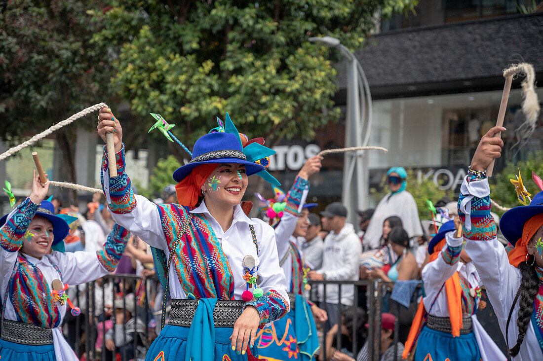 Different choreographic groups walk the path on the second day of the Blacks and Whites' Carnival. Pasto, Nariño, January 3, 2024.