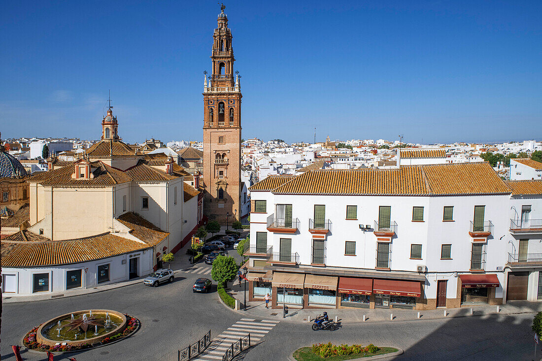 Alcázar puerta de Sevilla (Seville Gate) with San Pedro church in the background, Carmona, Andalusia, Spain. Old town Carmona Seville Andalusia South of Spain.