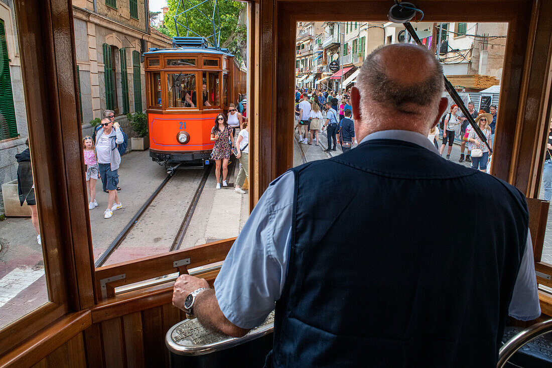 Driver of the vintage tram at Port de Soller village. The tram operates a 5kms service from the railway station in the Soller village to the Puerto de Soller, Soller Majorca, Balearic Islands, Spain, Mediterranean, Europe.