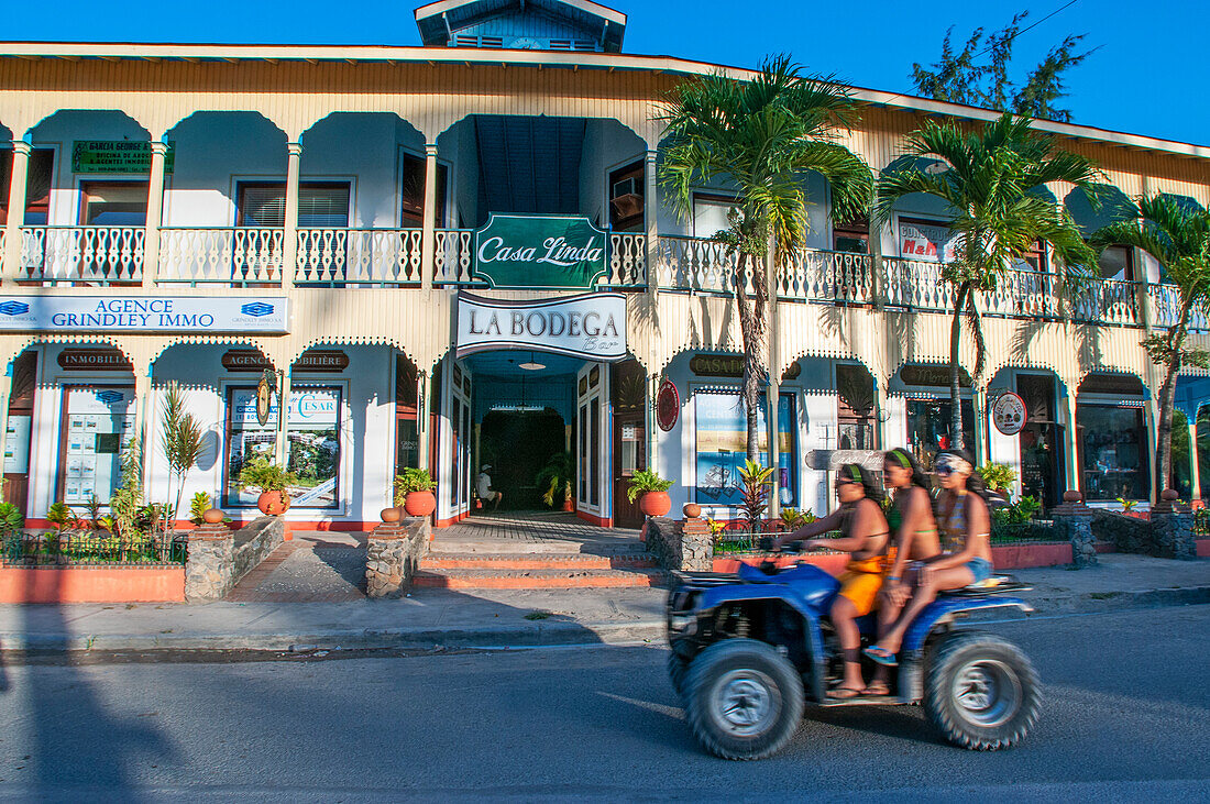 Grils in ATV All terrein vehicle quad in Las Terrenas city center Samana, Dominican Republic, Carribean, America.