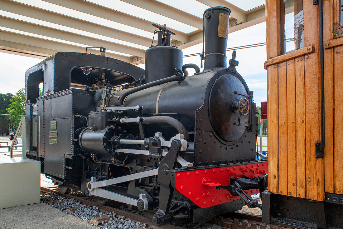 Old locomotive exhibition in Monistrol Central train station and Cremallera de Montserrat rack railway train. Monistrol de Montserrat, Spain