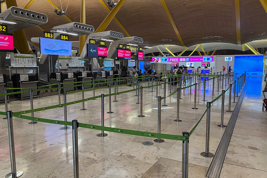 Departure check-in counters in Madrid Airport, Spain