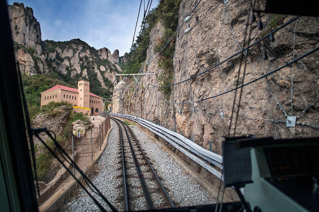 Cremallera Rack railway train climbing up Montserrat mountain, Monistrol de Montserrat, Barcelona, Spain.