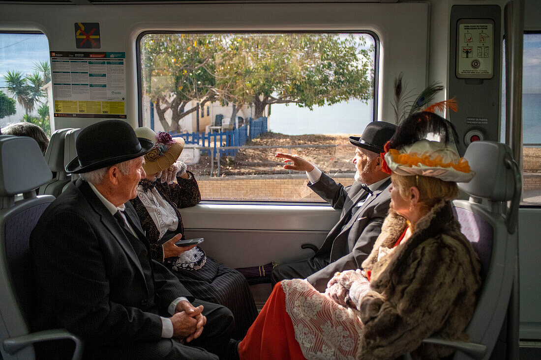 Badalona, Passengers in the modernism train that runs along the Catalan coast stopping at Gaudí buildings and historic gastronomic venues: Barcelona, Martaro and Canet de Mar