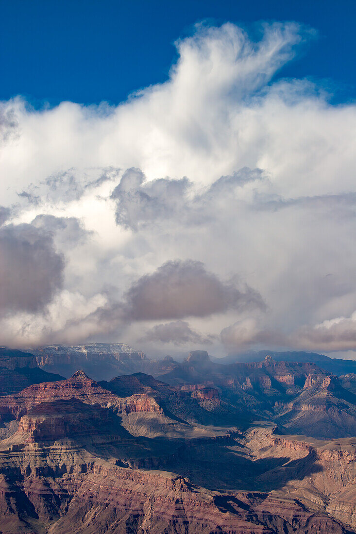 Winter snow squall over the canyon in Grand Canyon National Park, Arizona. Note the snow on the North Rim across the Canyon.
