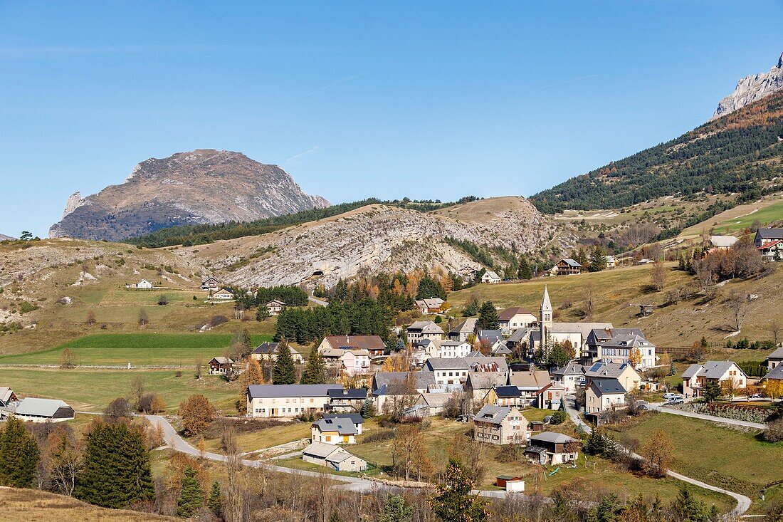 France, Hautes Alpes, Dévoluy massif, Saint Etienne en Dévoluy, the village and the Montagne de Saint Gicon (2086m) in the background