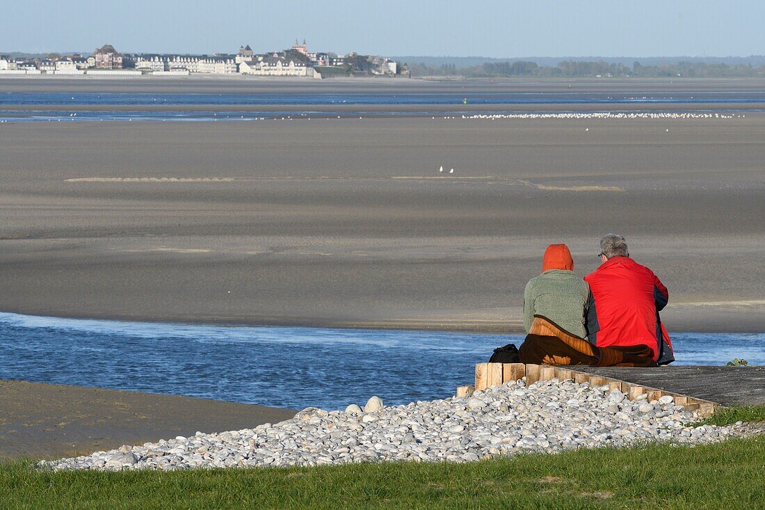 France, Somme, Baie de Somme, Cayeux sur Mer, tourist at the La Pointe du Hourdel at low tide facing the Crôtoy