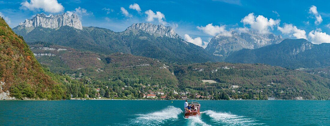 France, Haute Savoie, Annecy, walk on the lake by boat Riva collection in the bay of Talloires and the mountain of Tournette in panoramic view