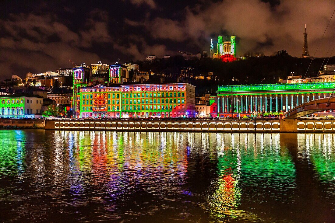 France, Rhone, Lyon, historical site listed as World Heritage by UNESCO, St Jean Cathedral, the courthouse at the edge of Saone River and Notre Dame de Fourviere Basilica during the Fete des Lumieres (Light Festival), show Reflets of Damien Fontaine on the hill of Fourviere