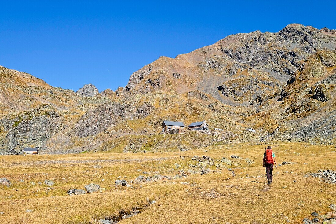 France, Isere, Revel, hiker close to the Pra moutain hut