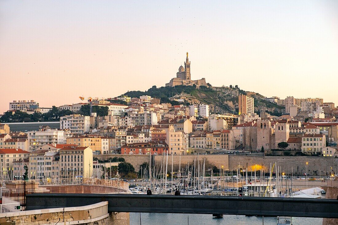 France, Bouches du Rhone, Marseille, the Old Port, the footbridge of Fort Saint Jean and the Notre Dame de la Garde basilica