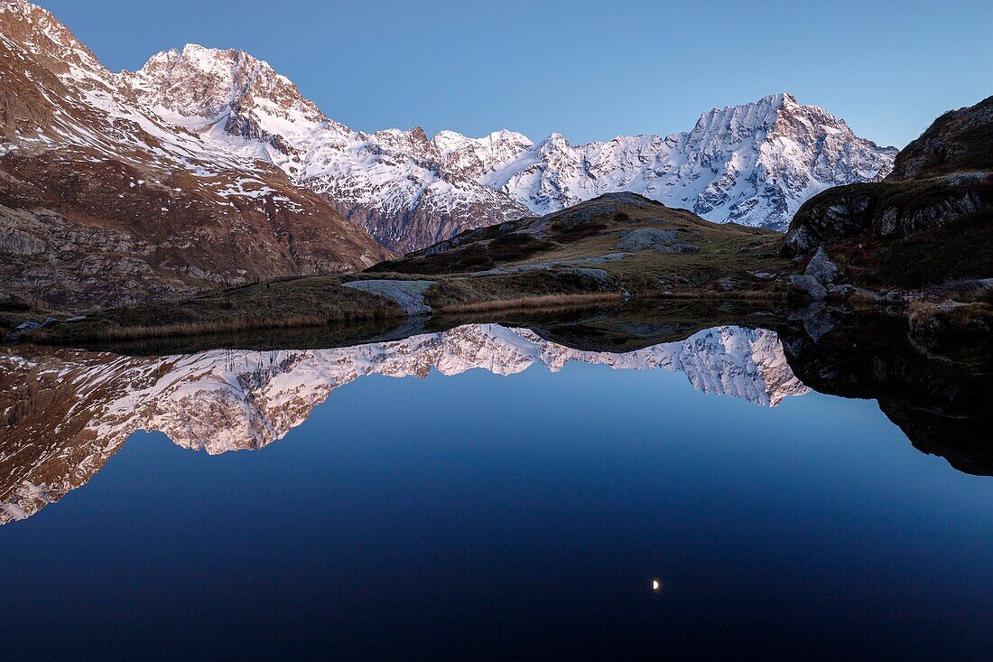 France, Hautes Alpes, national park of Ecrins, valley of Valgaudemar,La Chapelle en Valgaudémar, reflection of Sirac (3441m) on the lake of Lauzon (2008m), on the left the peak Jocelme (3458m)