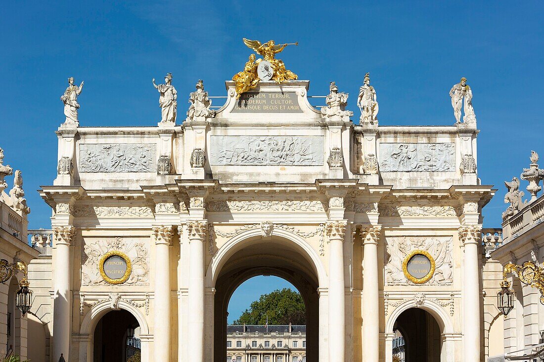 France, Meurthe et Moselle, Nancy, Stanislas square (former royal square) built by Stanislas Leszczynski, king of Poland and last duke of Lorraine in the 18th century, listed as World Heritage by UNESCO, detail of sculptures on top of the Arc d'Here (Here arch) named Groupe de la Renommee