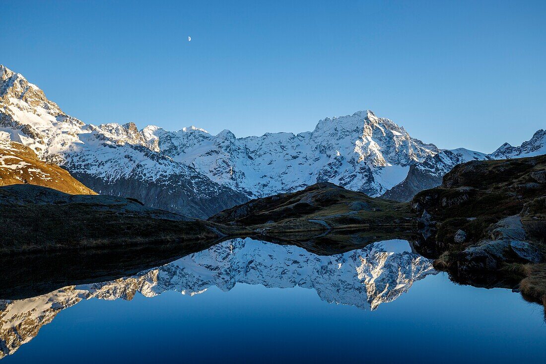 France, Hautes Alpes, national park of Ecrins, valley of Valgaudemar, La Chapelle en Valgaudémar, reflection of Sirac (3441m) on the lake of Lauzon (2008m)