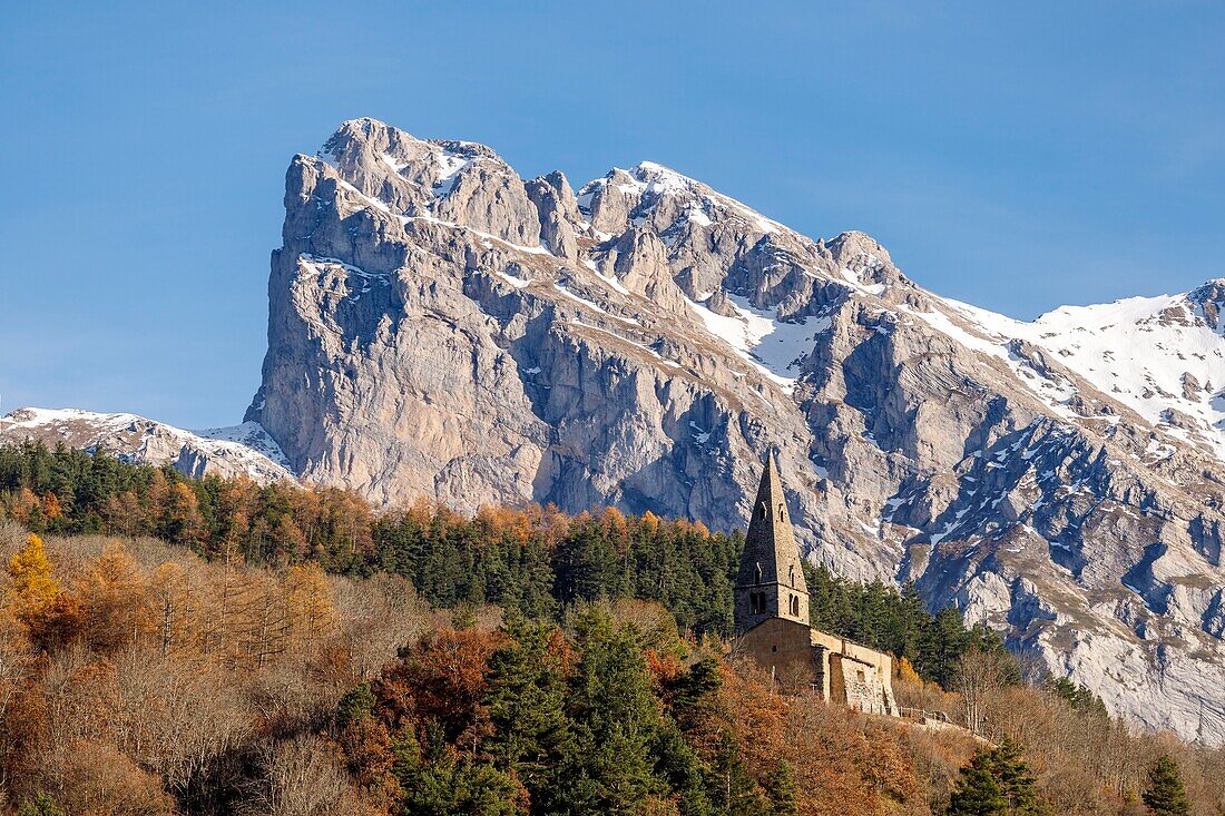 France, Hautes Alpes, the Dévoluy massif, Saint Disdier en Dévoluy, the chapel of Gicons Romanesque style of the eleventh and twelfth centuries, better known as La Mere Église, the Breach of Faraut on the Mountain of Faraut in the background