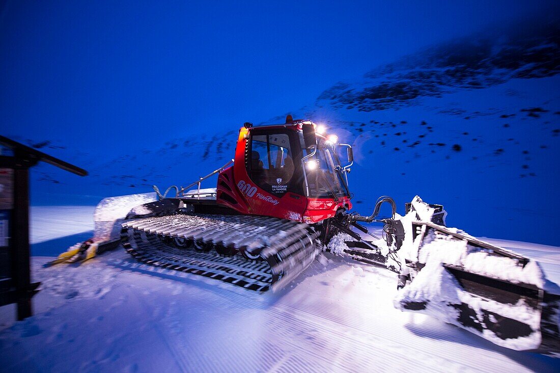 France, Savoie, Massif de la Vanoise, Pralognan La Vanoise, National Park, snow grooming to night on the slopes of the Gliere valley
