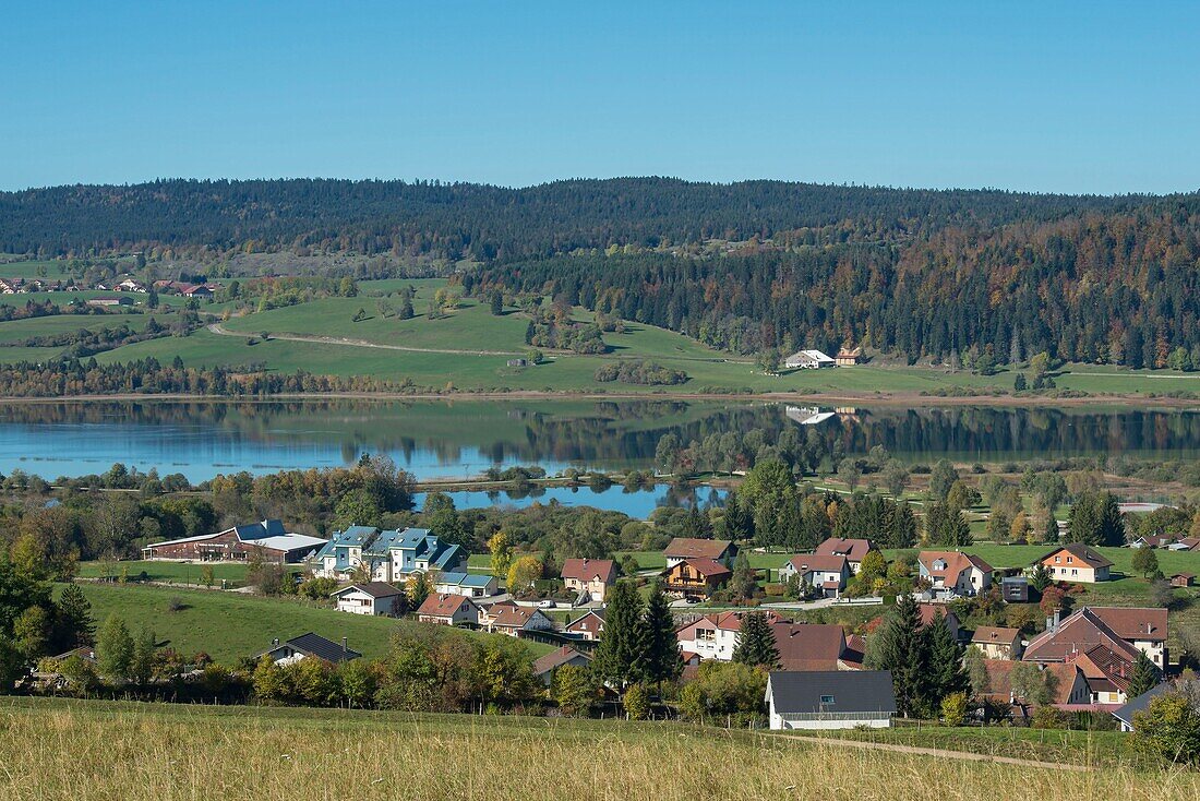 France, Doubs, at the top Doubs the village of Labergement Sainte Marie and the lake of Remoray