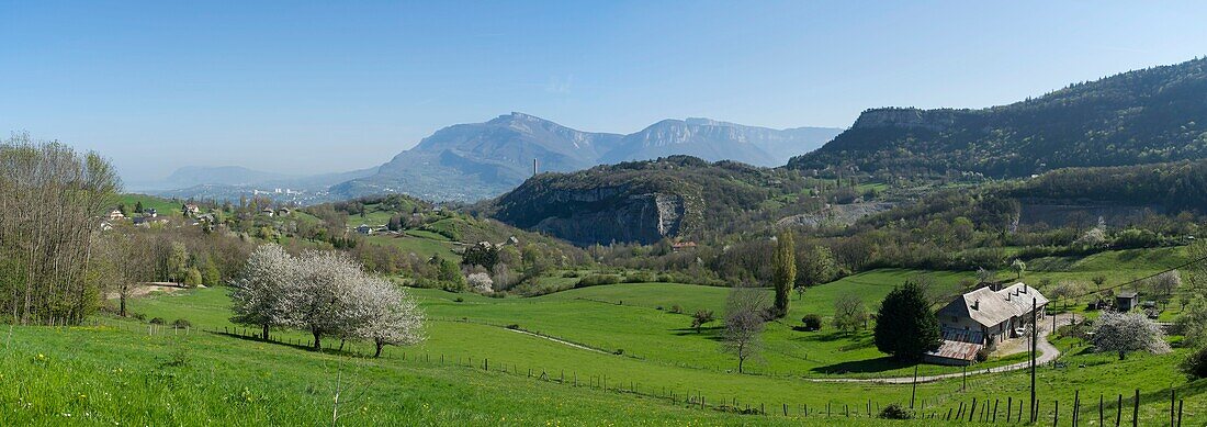 France, Savoie, Chambery, panoramic view of the Granier Pass road, the countryside towards Jacob Bellecombette and the cross of Nivollet which marks the Bauges massif