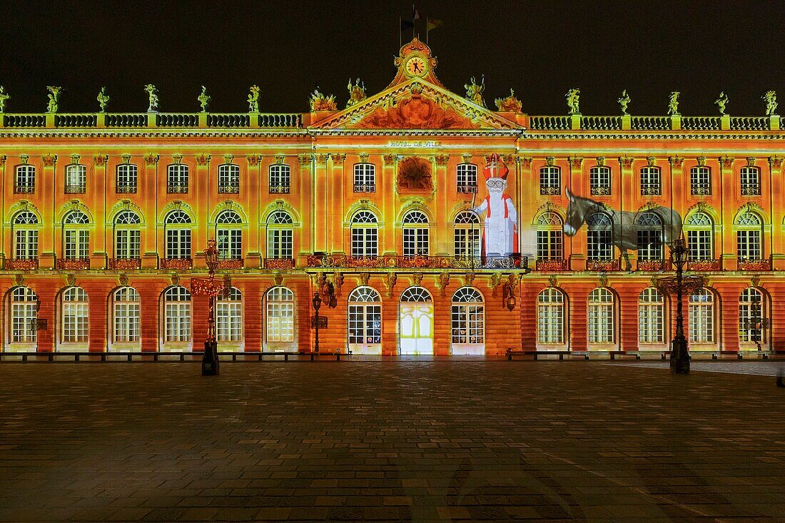 France, Meurthe et Moselle, Nancy, Stanislas square (former royal square) built by Stanislas Leszczynski, king of Poland and last duke of Lorraine in the 18th century, listed as World Heritage by UNESCO, facade of the townhall during the lightshow dedicated to Saint Nicolas