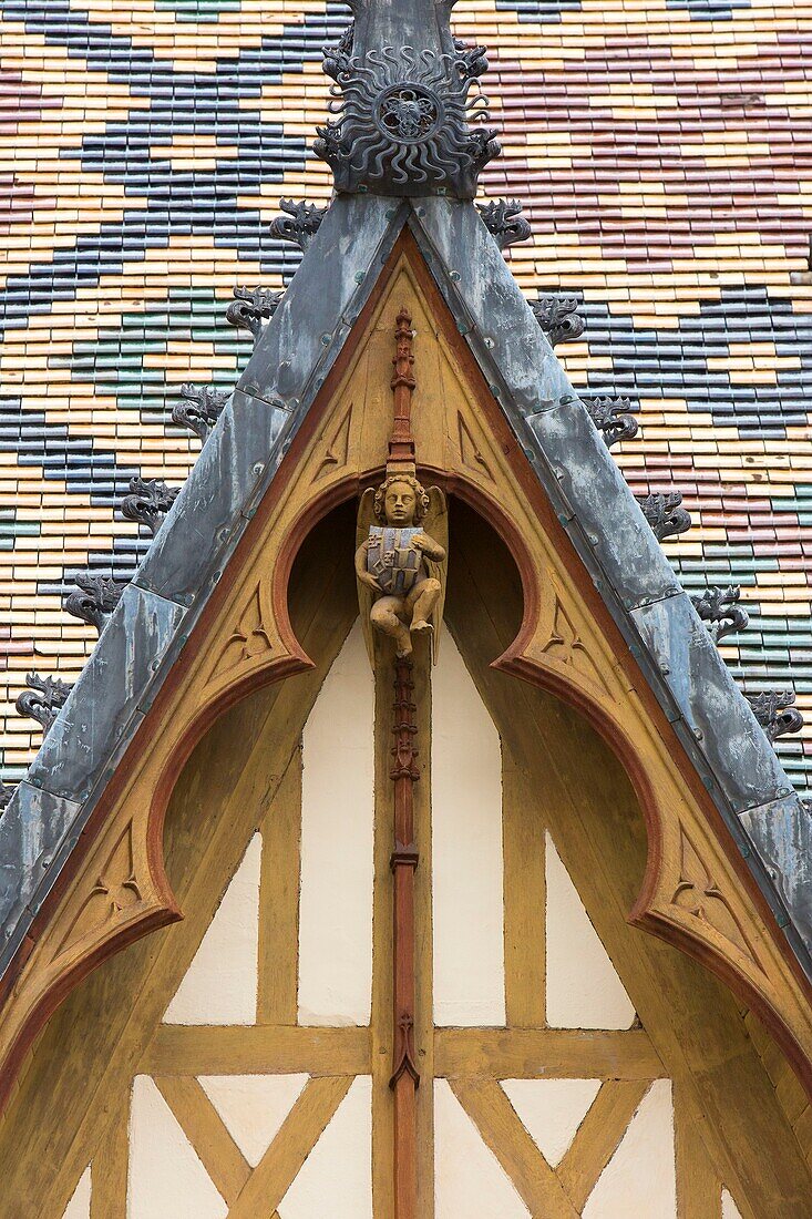France, Cote d'Or, Burgundy climates listed as World Heritage by UNESCO, Beaune, Hospices de Beaune, Hotel Dieu, roof in varnished tiles multicolored in courtyard, Hospices de Beaune, compulsory mention