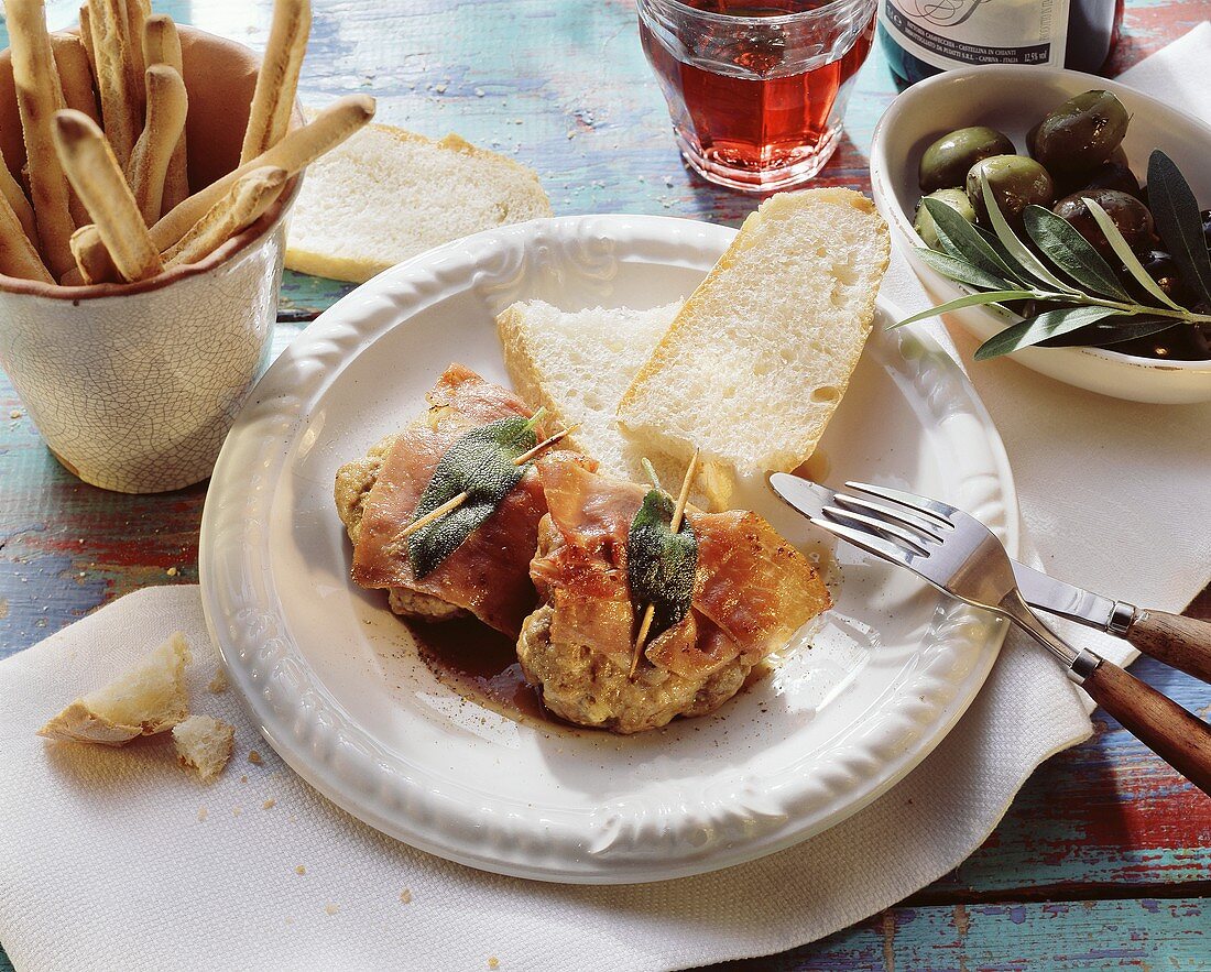 Veal frikadellas a la saltimbocca on plate