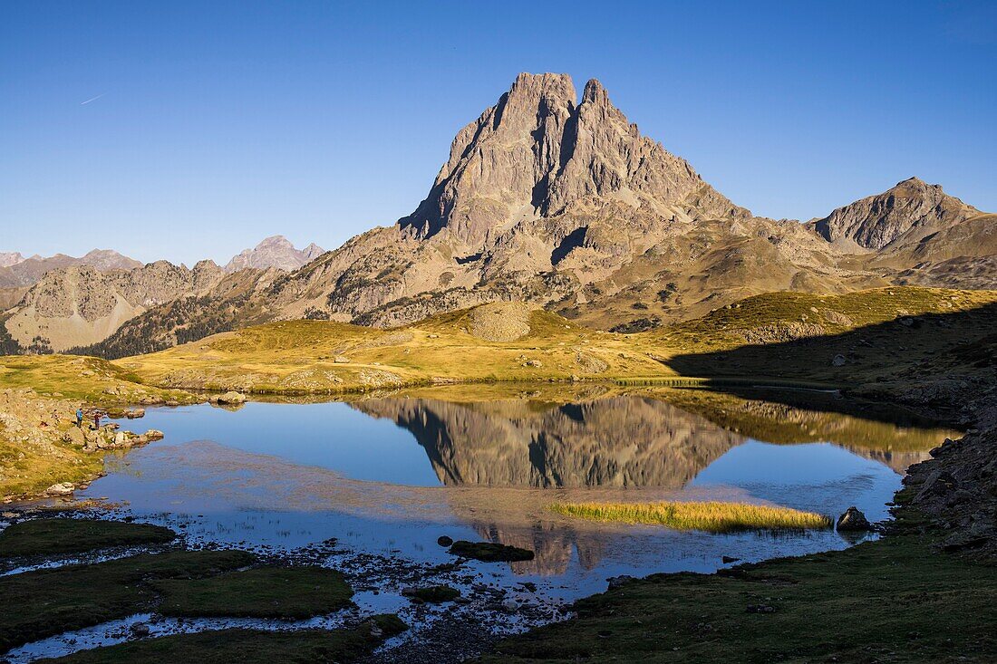 France, Pyrenees Atlantiques, Bearn, hiking in the Pyrenees, GR10 footpath, around the Ayous lakes, Miey Lake, Pic du Midi d'Ossau