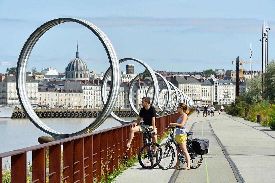 France, Loire Atlantique, Nantes, Ile de Nantes, quai des Antilles, Buren's rings on Loire River quays and the cupola of Notre Dame du Bon Port