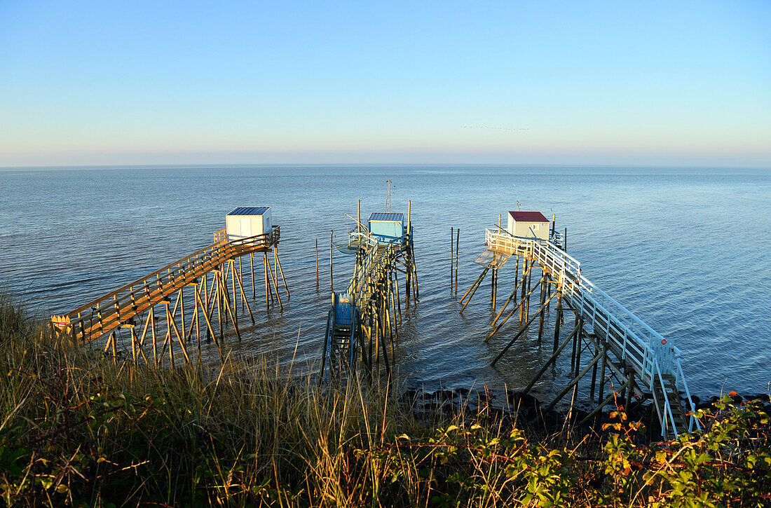 France, Charente Maritime, Gironde estuary, Talmont sur Gironde, labelled Les Plus Beaux Villages de France (The most beautiful villages of France), Carrelets (fisherman's hut) under the Caillaud cliffs