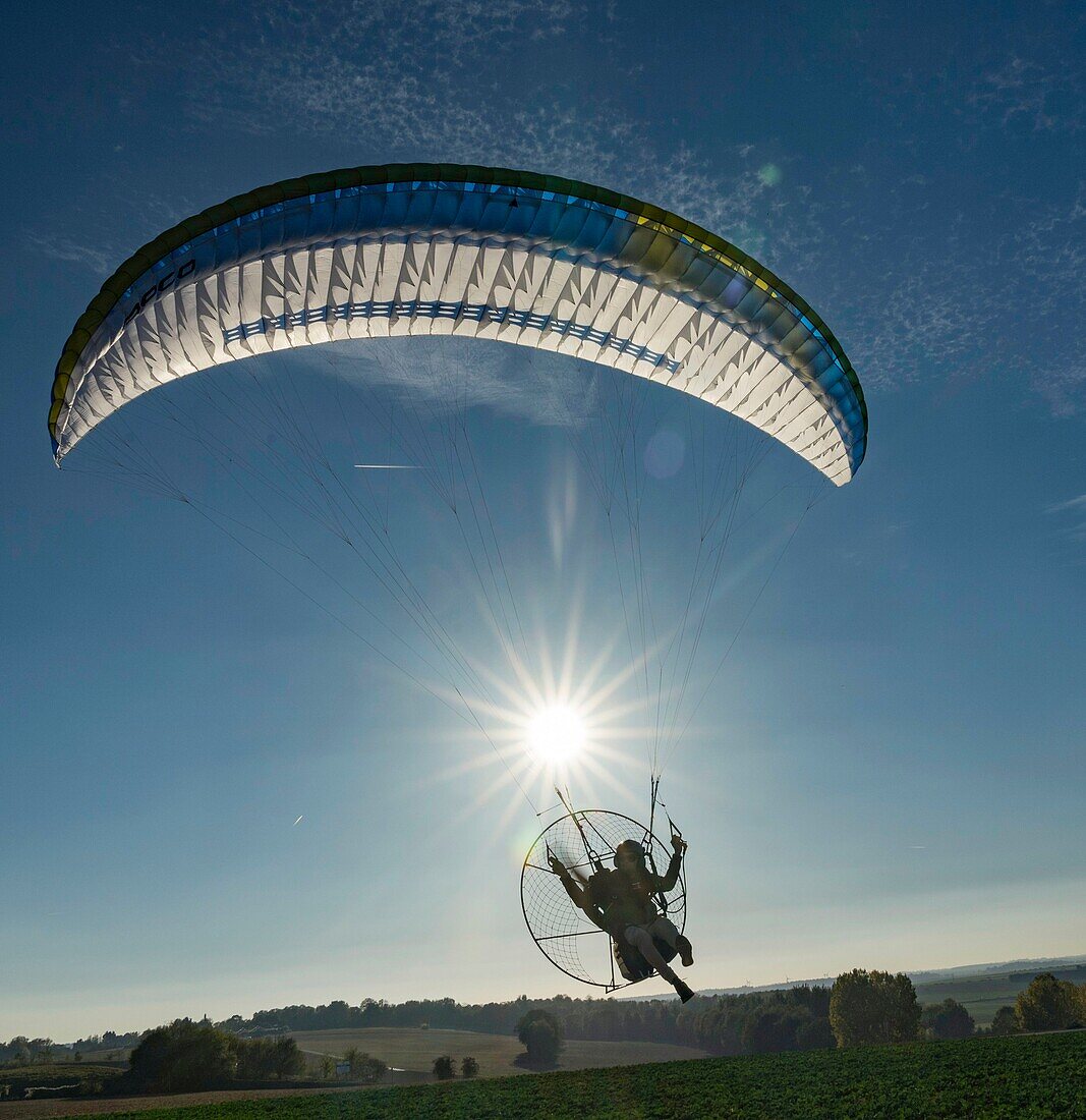 France, Eure, Les Thilliers en Vexin, paramotor in flight, wing Apco