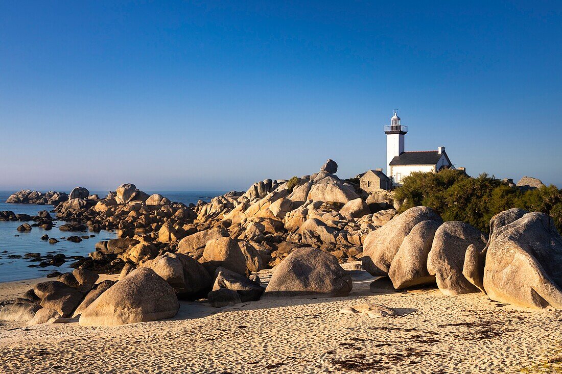 France, Finistere, Pagan country, Legend coast, Brignogan Plages, Beg Pol point, Pontusval lighthouse at sunset, listed as Historical monument