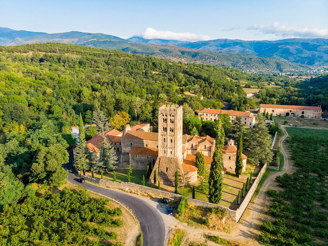 France, Pyrenees Orientales, Codalet, Abbey of Saint Michel de Cuxa, Regional Natural Park of the Catalan Pyrenees (aerial view)