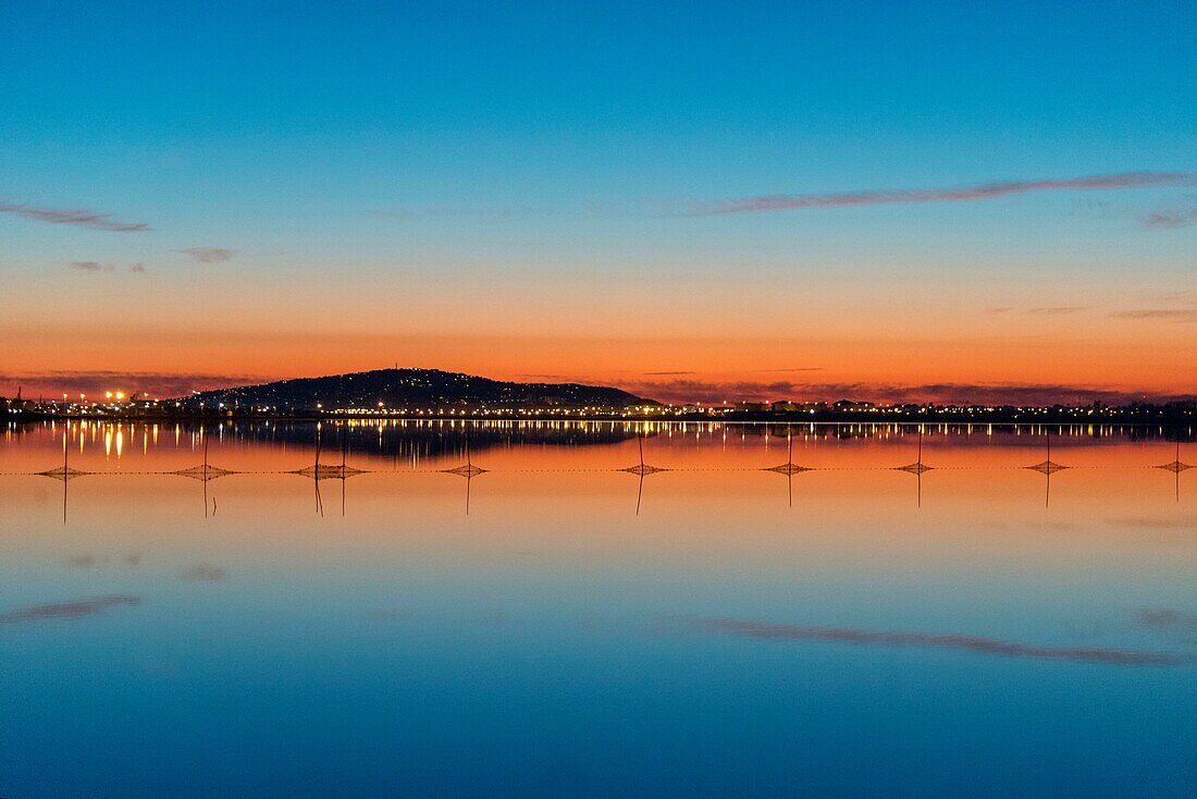 France, Herault, Frontignan, Saint Clair mount in the twilight seen since the pond of Ingril