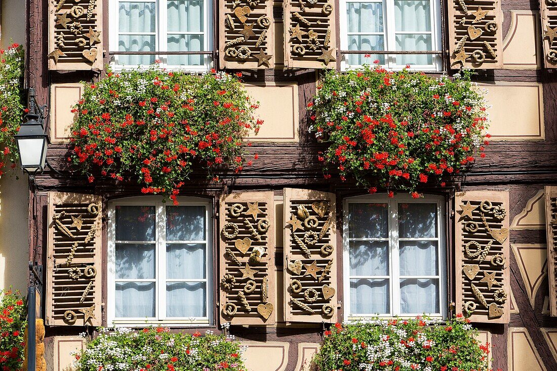 France, Haut Rhin, Route des Vins d'Alsace, Colmar, half timbered house of Kraetz baber's shop with decorated shutters on Place Jeanne d'Arc