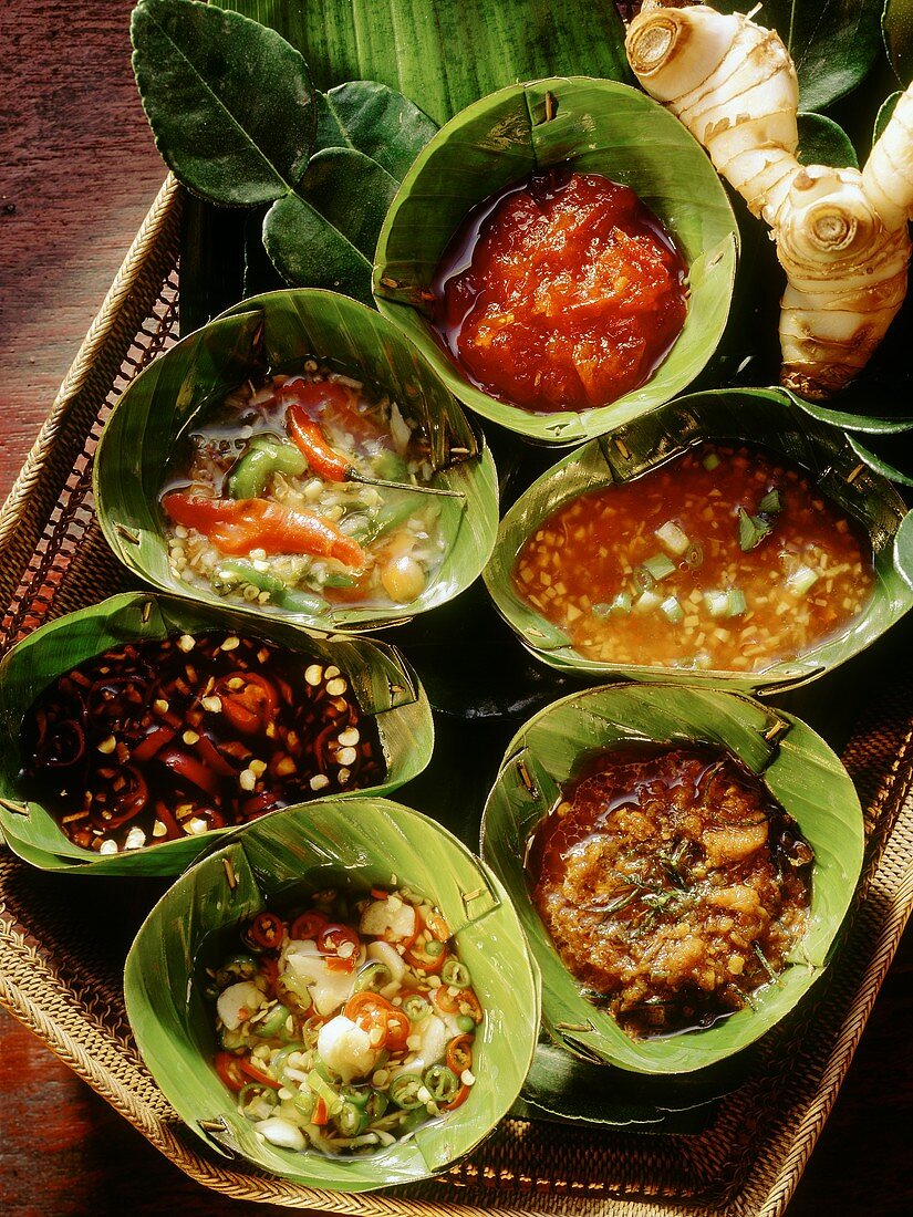 Thai sauces in banana leaf bowls