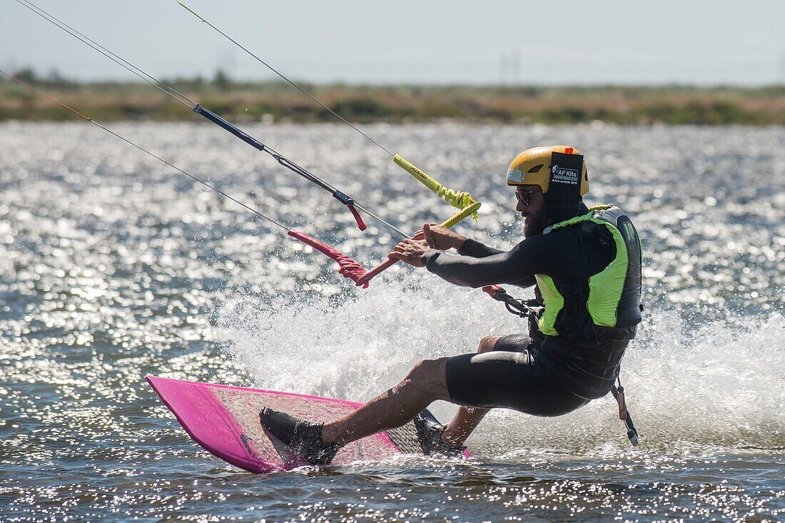 France, Herault, Meze, Kitesurfer on the lagoon of Thau