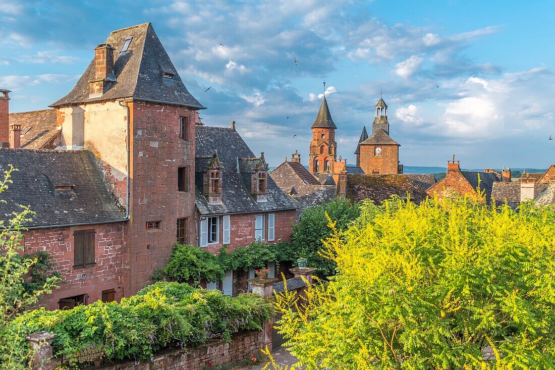 France, Correze, Dordogne Valley, Collonges la Rouge, labelled Les Plus Beaux Villages de France (The Most Beautiful Villages of France), village built in red sandstone, bell tower Saint Pierre church