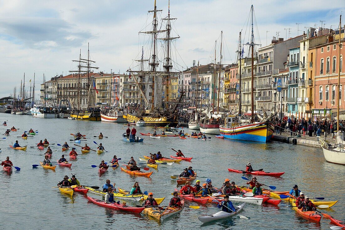 France, Herault, Sete, Escale a Sete festival, party of the maritime traditions, race of kayaks in the face of a flotille of sailboats