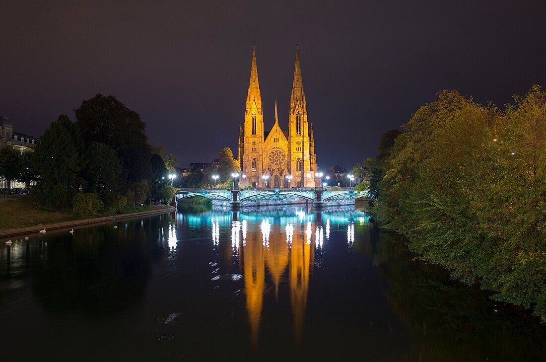 France, Bas Rhin, Strasbourg, German district listed on UNESCO World Heritage list, Saint Paul lutherian church and reflection in Ill river