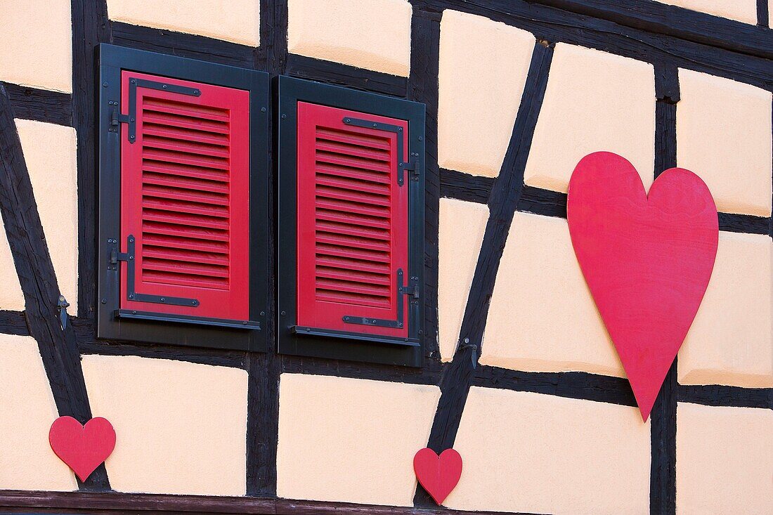France, Haut Rhin, Route des Vins d'Alsace, Eguisheim labelled Les Plus Beaux Villages de France (One of the Most Beautiful Villages of France), facade of a traditional house