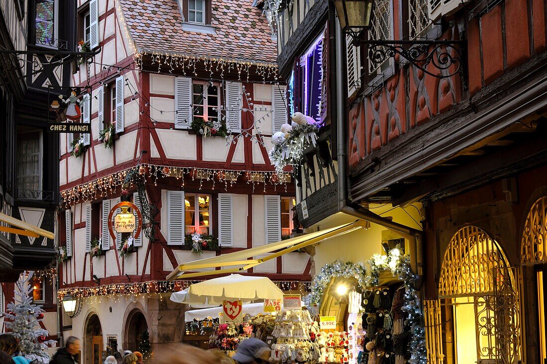 France, Haut Rhin, Colmar, Rue des Marchands, half-timbered houses, illuminations during the Christmas market