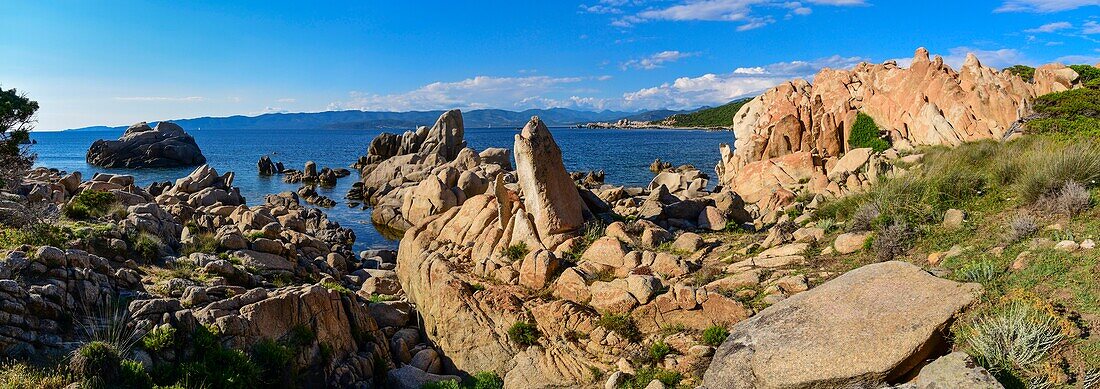France, Corse du Sud, Campomoro, Tizzano, hiking on the coastal path of the reserve, Senetosa, the panoramic view of these granite chaos is striking at sunset