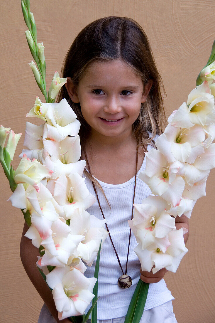 Girl holding Gladiolus