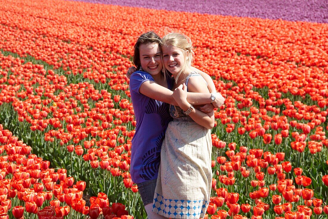 Girls in flower field