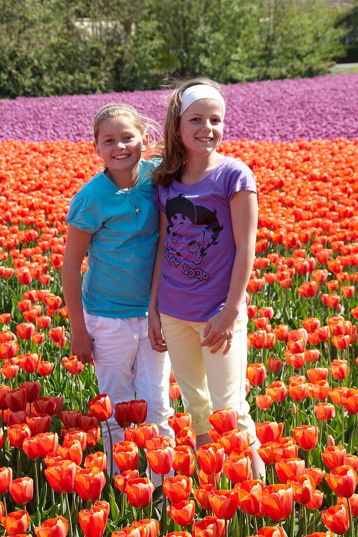 Girls in flower field