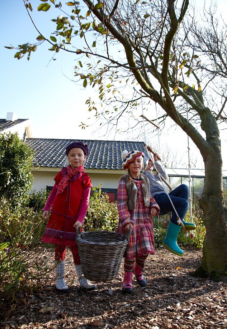 Girls holding basket