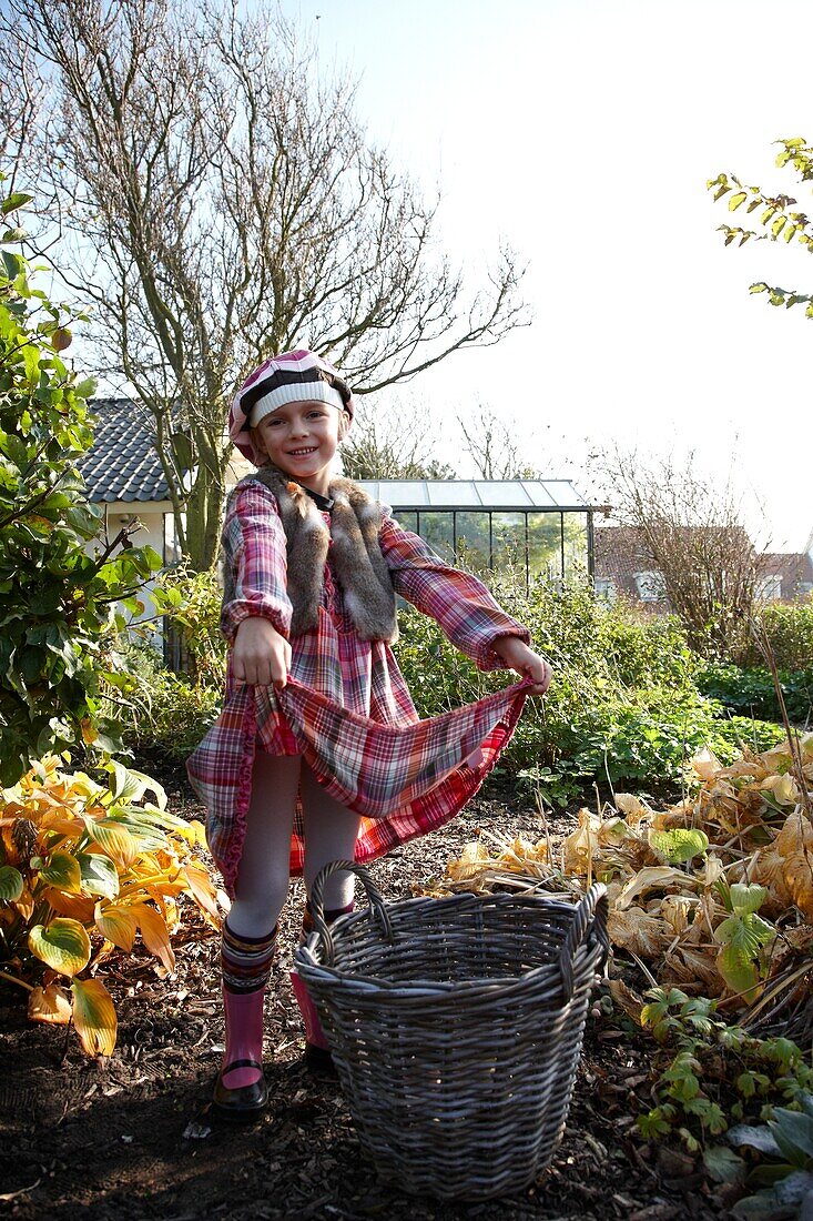 Girl collecting apples