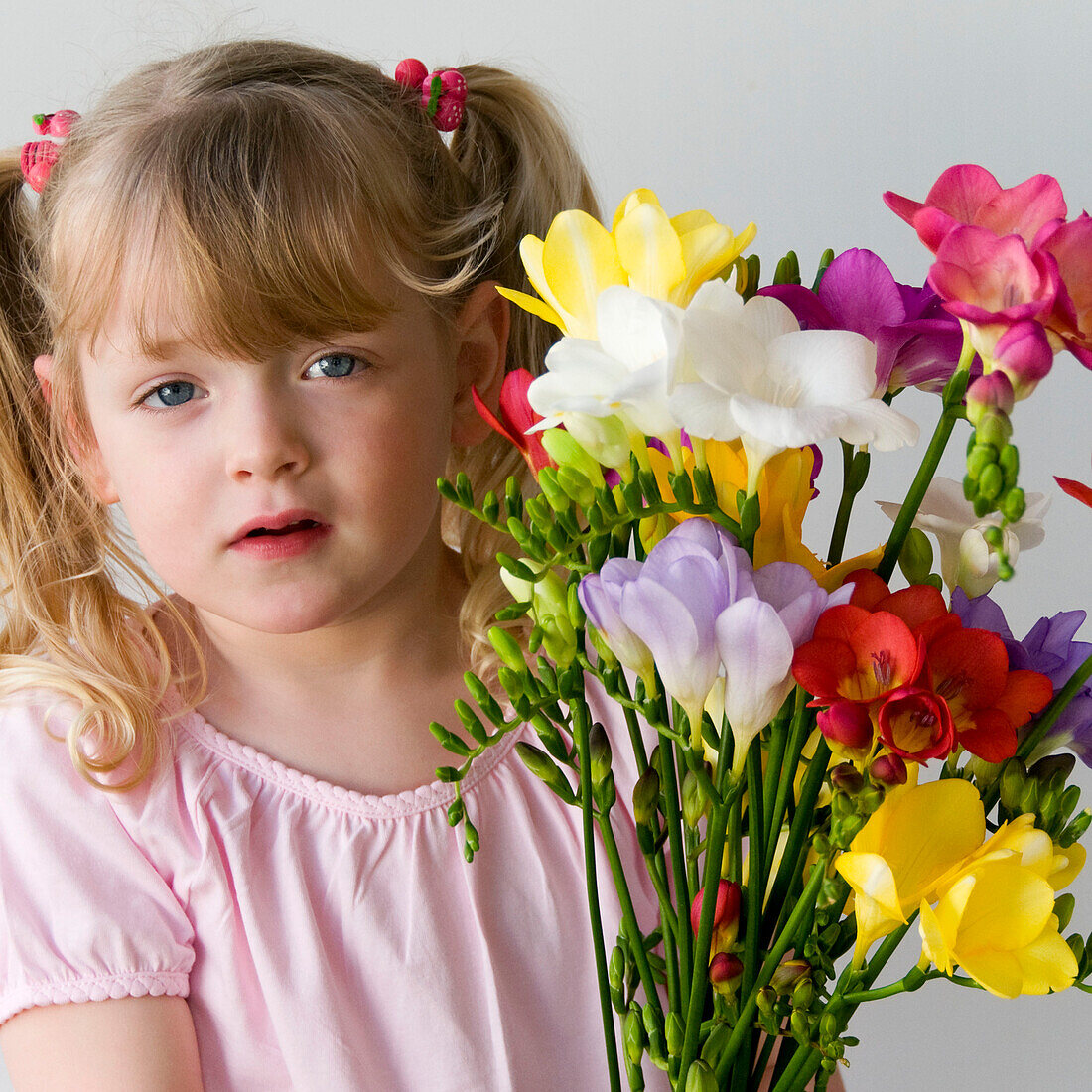 Girl holding Freesia