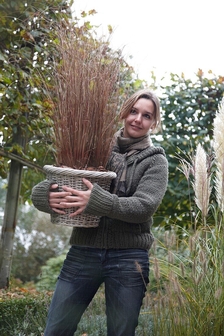 Woman holding Cortaderia