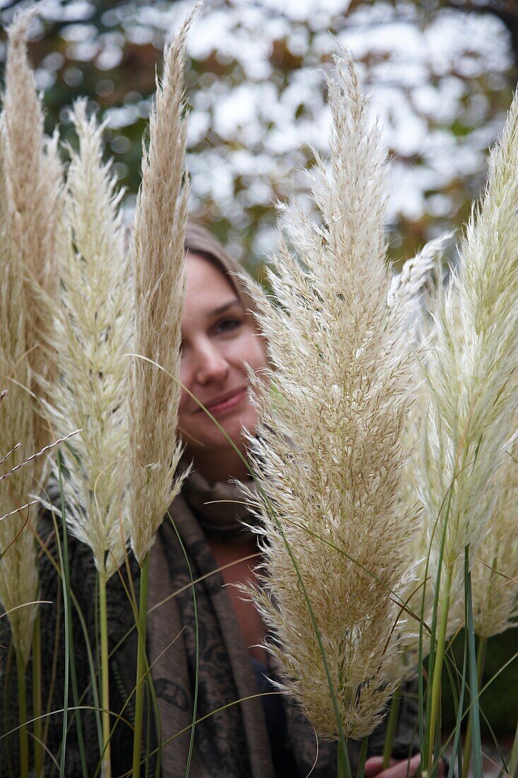 Woman holding Cortaderia