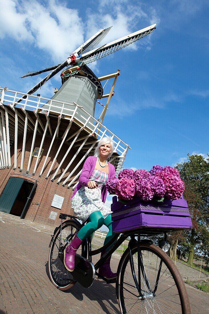 Woman riding bike in park